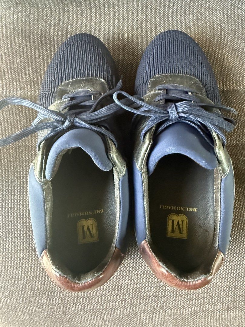 Bruno Magli Navy Knit & Leather Sneakers (Category: Casual Shoes) located in Iloilo. Submitted by darvoza (Listing ID 1447496922, Image 2). Description: - Navy blue knit sneakers - Metallic leather accents - Lace-up style - Comfortable for everyday wear - Bruno Magli logo on insoles - Great casual shoes.