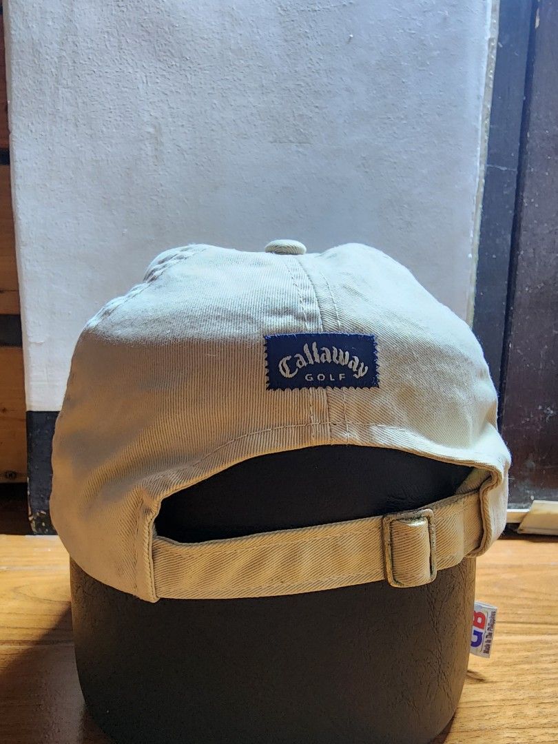 Callaway Golf Cap (Category: Caps & Hats) located in Meycauayan. Submitted by MP_Shop (Listing ID 1447571998, Image 2). Description: - Khaki Callaway Golf Cap - Embroidered Callaway logo on front - Adjustable strap for a comfortable fit - Made in Bangladesh - Ideal for golf or everyday casual wear.