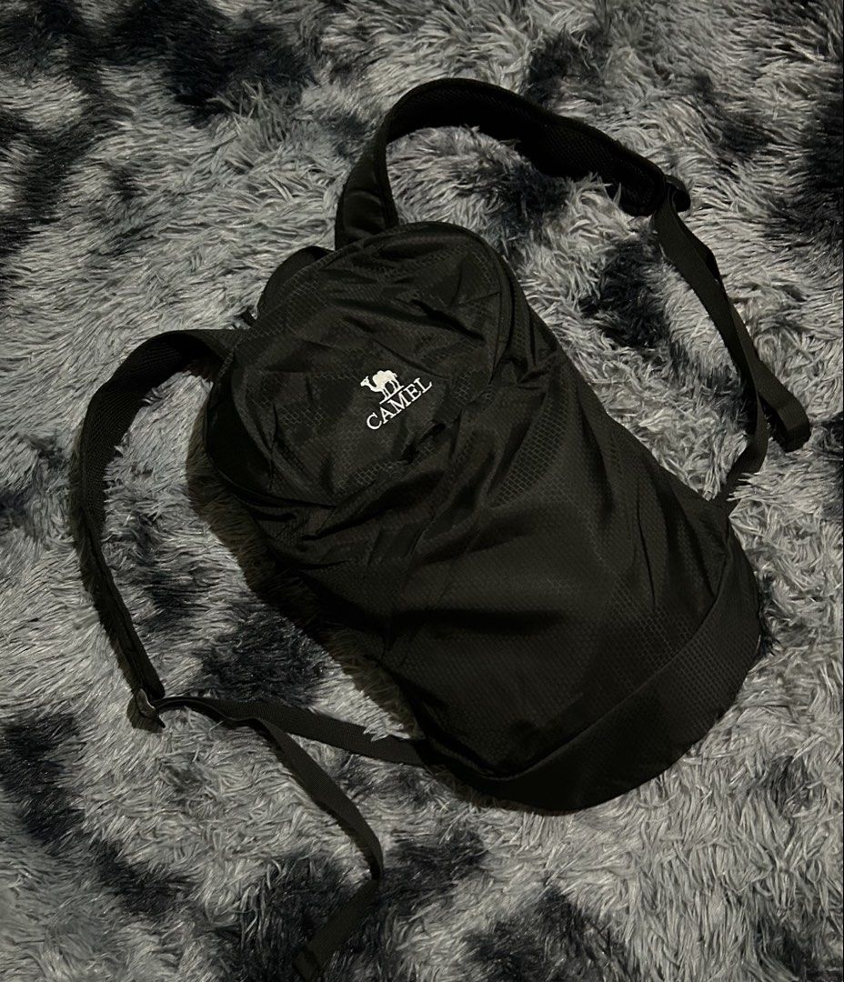 Camel Lightweight Foldable Backpack Black W11 L20 (Category: Backpacks) located in Cadiz. Submitted by jaybatiller (Listing ID 1447511513, Image 2). Description: - Brand: Camel - Color: Black - Type: Foldable Backpack - Features: Lightweight, easy to pack, adjustable straps - Ideal for: Travel, everyday use - Compartment: Main compartment with zip closure - Care: See label for details.