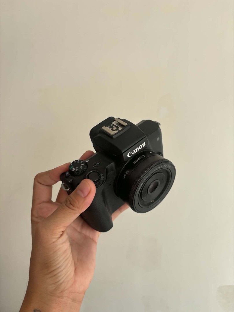 Canon EOS M50 Mirrorless Camera with 15-45mm Lens (Category: Cameras) located in Tuguegarao City. Submitted by annelimitedshop (Listing ID 1447473208, Image 1). Description: - Canon EOS M50 Mirrorless Camera - Includes 22mm Lens - Excellent for both Photos and Videos - Flip-out Screen: Great for Vlogging & Selfies - Good Working Condition - Ready for your next adventure!.