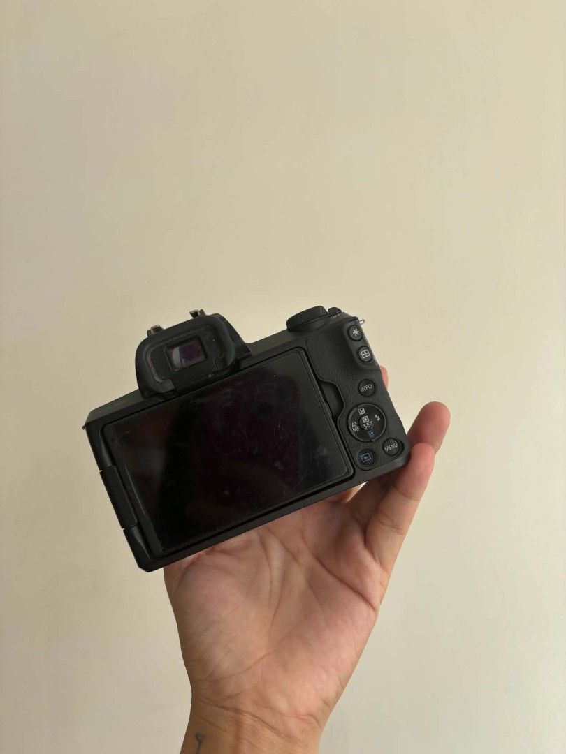 Canon EOS M50 Mirrorless Camera with 15-45mm Lens (Category: Cameras) located in Tuguegarao City. Submitted by annelimitedshop (Listing ID 1447473208, Image 2). Description: - Canon EOS M50 Mirrorless Camera - Includes 22mm Lens - Excellent for both Photos and Videos - Flip-out Screen: Great for Vlogging & Selfies - Good Working Condition - Ready for your next adventure!.