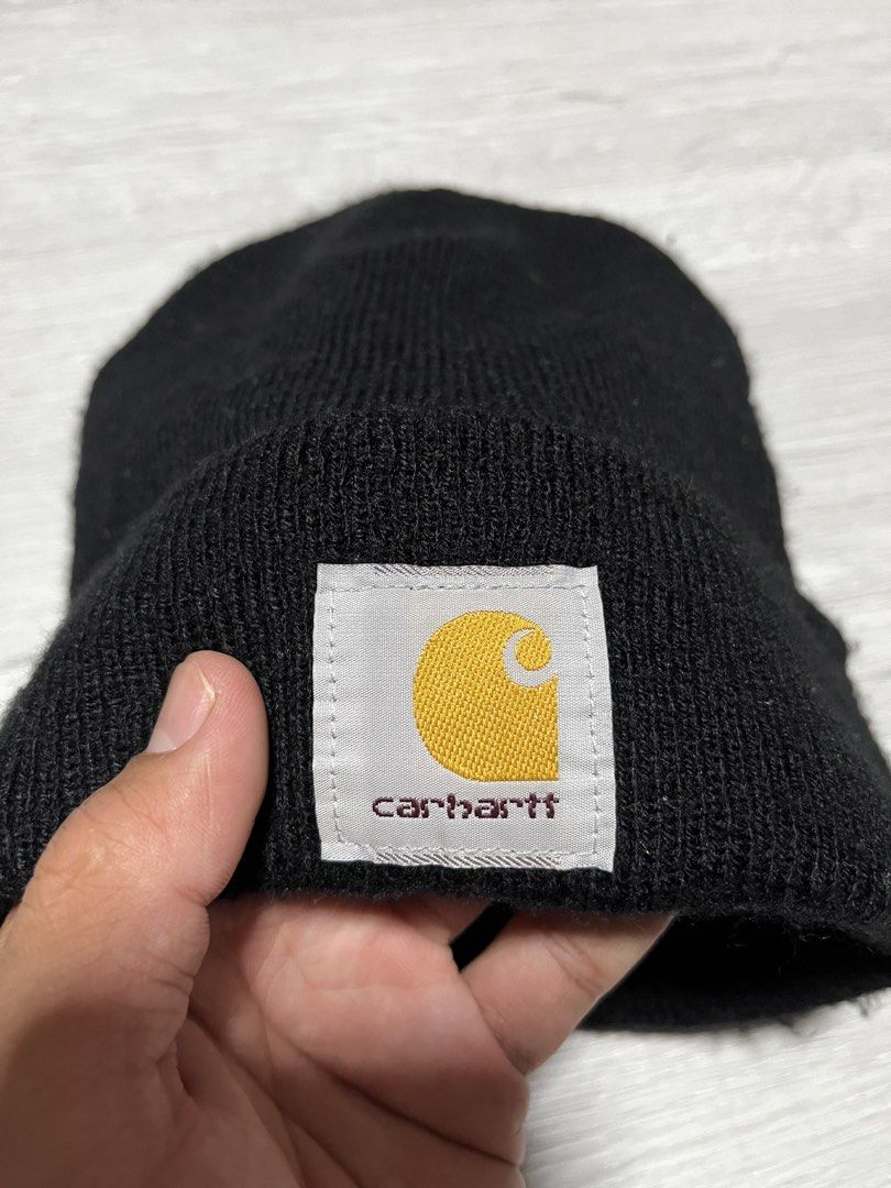 Carhartt Black Acrylic Beanie Hat (Category: Caps & Hats) located in Manila. Submitted by jorgemabelin2001 (Listing ID 1447491063, Image 2). Description: - Classic black Carhartt beanie - Made from 100% acrylic - One size fits all - Ideal for keeping warm - Easy to style with any outfit - Care instructions: Hand wash recommended, dry clean only, do not bleach.