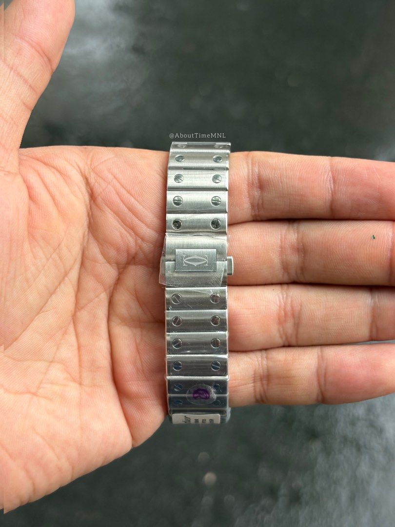 Cartier Santos Medium (Category: Luxury Watches) located in Manila. Submitted by abouttimemnl2 (Listing ID 1447669330, Image 3). Description: Brand New Cartier Medium Santos With free leather strap Watch and leather pouch only (dm if you want with box) Dm if interested! On hand and ready to ship.