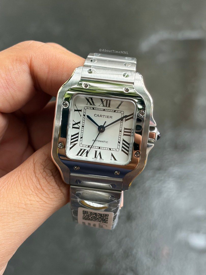 Cartier Santos Medium (Category: Luxury Watches) located in Manila. Submitted by abouttimemnl2 (Listing ID 1447669330, Image 2). Description: Brand New Cartier Medium Santos With free leather strap Watch and leather pouch only (dm if you want with box) Dm if interested! On hand and ready to ship.