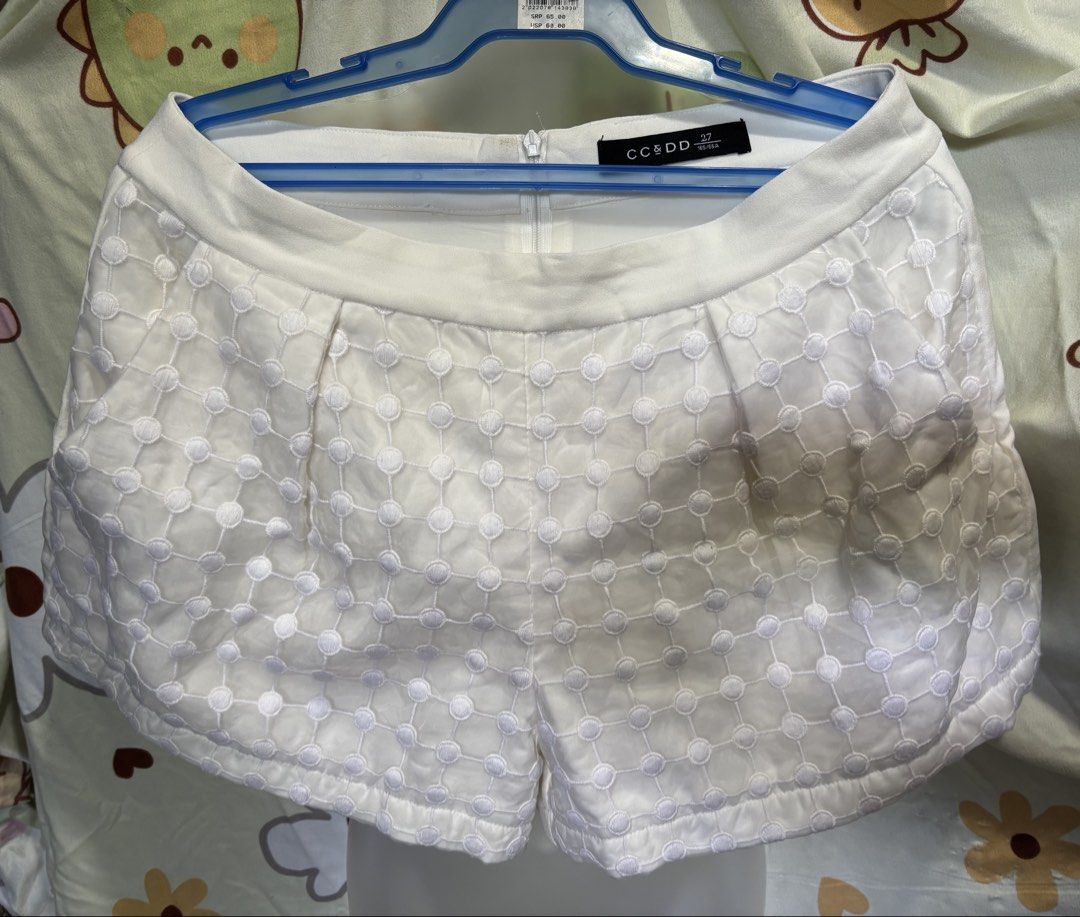 CCSDD White Eyelet Shorts (Category: Shorts) located in Orani. Submitted by cathsclothing (Listing ID 1447502946, Image 3). Description: Size: 27”-28” waist Length 12” 2 size Pocket Back Zipper - White eyelet shorts from CCSDD - Features a cute circular pattern all over - Lined inside for comfort - Zipper closure at the back - Versatile for casual wear or dressing up.