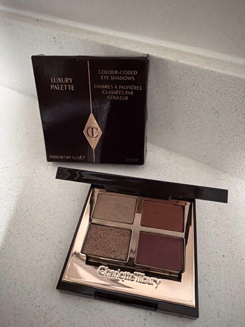 Charlotte Tilbury Luxury Palette Eyeshadow (Category: Makeup) located in Cainta. Submitted by mycosy.life (Listing ID 1447514228, Image 2). Description: - Charlotte Tilbury Luxury Palette - Colour-coded eyeshadows - Features 4 versatile shades - Perfect for creating multiple looks - Comes in original packaging.