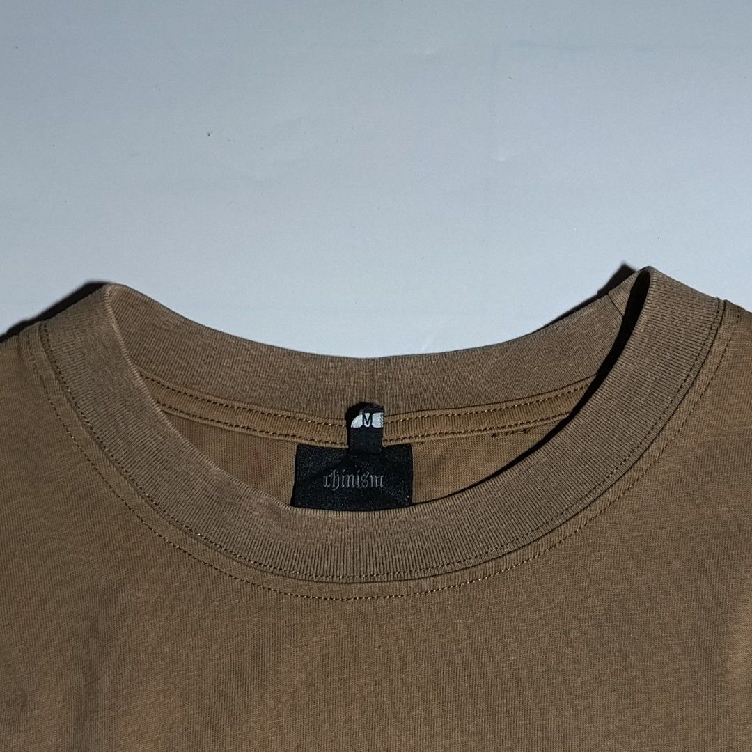 CHINISM Choco Brown Tshirt (Category: Tshirts & Polo Shirts ) located in Manila. Submitted by deftzy (Listing ID 1447630253, Image 3). Description: Pit to pit: 21" Length: 27" Shoulder: 20" MEDIUM ON TAG EXCELLENT CONDITION NO ISSUE.