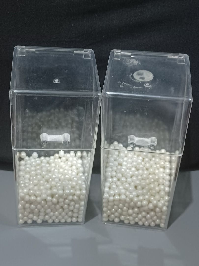 Clear Plastic Storage Containers with White Beads (Category: Storage Boxes & Baskets) located in Quezon City. Submitted by ianelles.closet (Listing ID 1447512321, Image 2). Description: - Set of 2 clear plastic storage containers - Features hinged lids for easy access - Filled with beautiful pearly white beads - Ideal for organizing makeup brushes - Round alcohol mark is the only "damage" sa item - Feel free to ask any questions!.