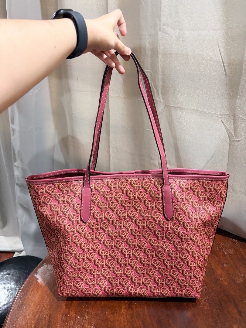 Coach City Tote Bag (Category: Tote Bags) located in Manila. Submitted by declutterwmeh (Listing ID 1447480614, Image 2). Description: Coach City Tote Bag With Signature Monogram Print in Rogue Pink Like new condition No flaws Guaranteed original from US Rfs: not my style 6,500 + S.F (c/o buyer) Low ballers will not be entertained .