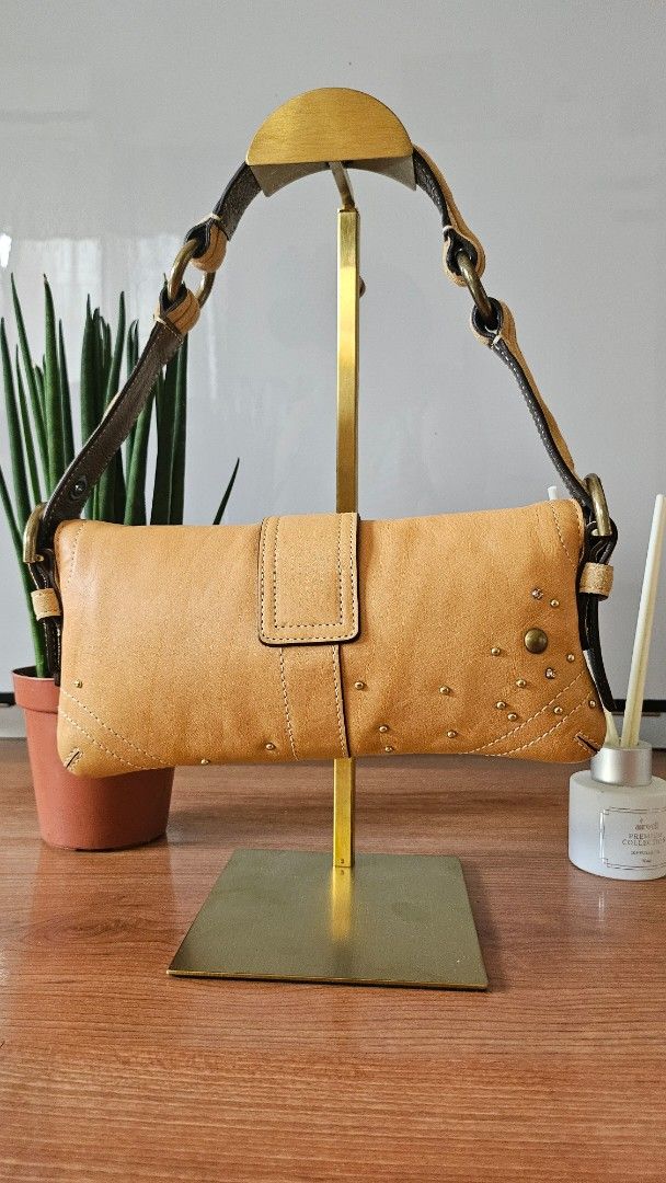 Coach Soho Demi Flap (Category: Luxury Bags & Wallets) located in Quezon City. Submitted by smariemerc46809 (Listing ID 1447503011, Image 2). Description: - Authentic Coach Soho Demi Flap - Stylish buckle closure - All-over decorative stud and rhinestones embellishments - Preloved Excellent condition.