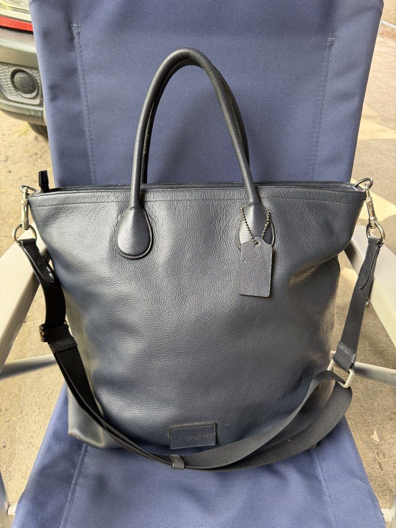 COACH XL NAVY BLUE CARRY ALL BAG (Category: Luxury Bags & Wallets) located in General Santos City (Dadiangas). Submitted by prelovedpickers (Listing ID 1447532277, Image 3). Description: XL Size Navy blue Coach leather tote. 15x14x4.5” Good pre-owned condition Pebbled leather Zip closure 2 short carrying handles 1 long strap Coach tag attached 3 inner compartments Kasya Laptop 16 inches perfect for work bag ..