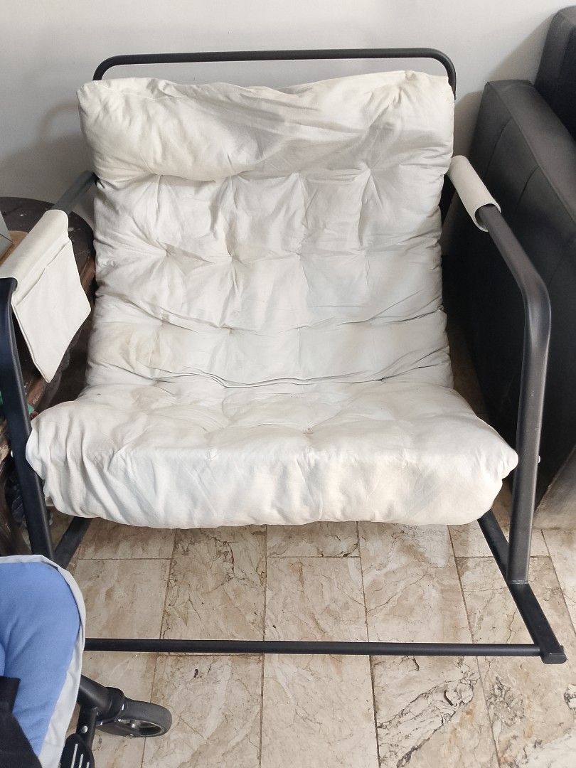 Comfortable Padded Metal Frame Chair (Category: Chairs) located in Pasig City. Submitted by marielleplus (Listing ID 1447484551, Image 1). Description: - Sturdy black metal frame - Thick, comfortable white tufted cushion - Ideal for relaxing - Fits any living space - Easy to move around need lang labhan yung cushion then all good na. wala na po kasi ako time na labhan because of my little one.