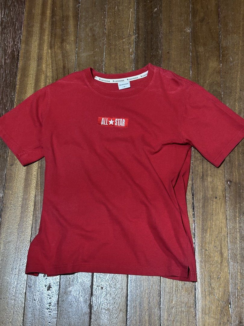 Converse All Star Red T-shirt Size M (Category: Shirts) located in Pasig City. Submitted by prettycloset2999 (Listing ID 1447498610, Image 1). Description: - Red Converse T-shirt - Features 'All Star' graphic on chest - Comfortable and casual design - Perfect for everyday wear - Size: Medium (M) - Please check photos for condition details.