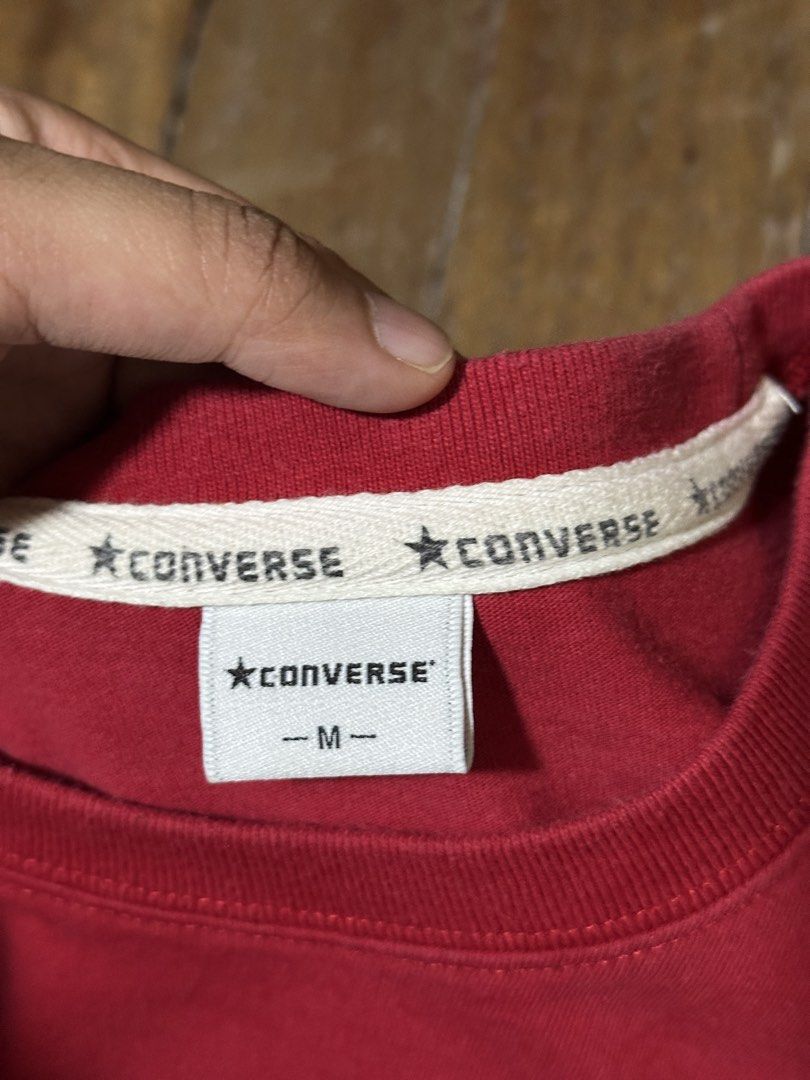 Converse All Star Red T-shirt Size M (Category: Shirts) located in Pasig City. Submitted by prettycloset2999 (Listing ID 1447498610, Image 2). Description: - Red Converse T-shirt - Features 'All Star' graphic on chest - Comfortable and casual design - Perfect for everyday wear - Size: Medium (M) - Please check photos for condition details.