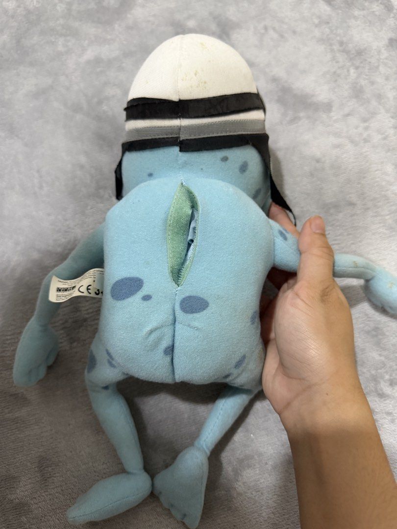 Crazy Frog Function Sing plush (Category: Toys & Games) located in Kuala Lumpur. Submitted by orangmelayu93 (Listing ID 1447538879, Image 2). Description: - Adorable Crazy Frog plush toy. - Features a unique blue color with distinctive spots. - Comes equipped with a cool helmet and goggles. - Includes a convenient slit on the back. - Ideal for fans of the Crazy Frog meme and character. - A fun and quirky collectible item. -Item function well sing