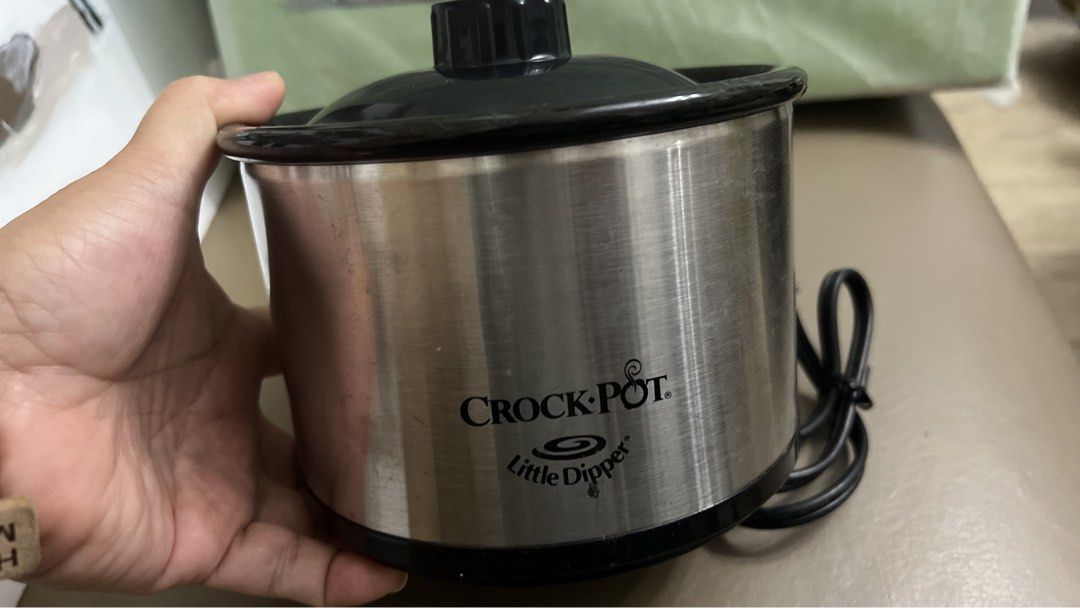 Crock-Pot Little Dipper Slow Cooker (Category: Cookers) located in Paranaque City. Submitted by ejgscloset (Listing ID 1447637416, Image 3). Description: - Crock-Pot Little Dipper for sale - Ideal for dips, sauces, and small meals - Features a stainless steel exterior and black lid - Compact size, perfect for easy storage - Great for entertaining or personal use - Unit is in good working condition - Never been used. - 110V bought in US.