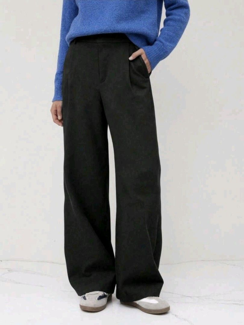 Dark Grey Wide Leg Trousers (Category: Other Bottoms) located in Kuala Lumpur. Submitted by hodorable (Listing ID 1447573786, Image 3). Description: - Dark grey wide leg trousers - High waisted with pleated front - Side pockets - Relaxed fit - Versatile for casual or work wear - Brand new, never worn - Flowy - Buy two for free shipping.