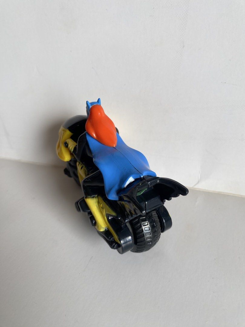 DC Comics Batgirl Motorcycle & Robin Figure with Batman Case (Category: Vehicle & Diecast Models) located in Manila. Submitted by declutterthingzzz (Listing ID 1447520409, Image 3). Description: - Yellow and black Batgirl motorcycle with iconic Batman logo. - Comes with a Robin action figure. - Includes a Batman mask case featuring a yellow handle. - Ideal gift for any DC Comics enthusiast. - Great fun for children. Batman - 100 Robin - 180 Batgi