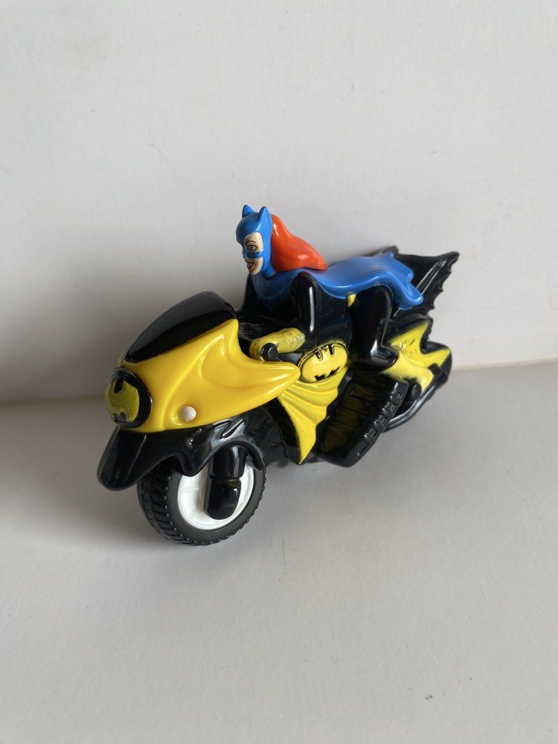 DC Comics Batgirl Motorcycle & Robin Figure with Batman Case (Category: Vehicle & Diecast Models) located in Manila. Submitted by declutterthingzzz (Listing ID 1447520409, Image 2). Description: - Yellow and black Batgirl motorcycle with iconic Batman logo. - Comes with a Robin action figure. - Includes a Batman mask case featuring a yellow handle. - Ideal gift for any DC Comics enthusiast. - Great fun for children. Batman - 100 Robin - 180 Batgi