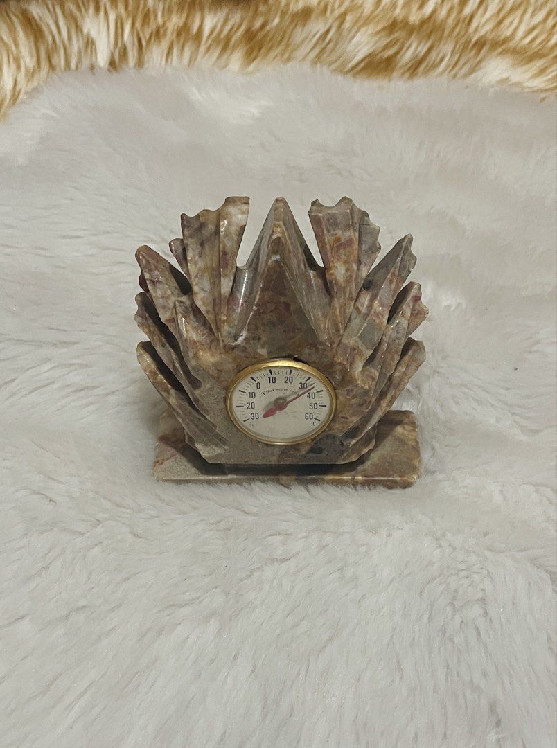 Decorative carved onyx marble desk thermometer (Category: Thermometers) located in Quezon City. Submitted by sissymissy1527 (Listing ID 1447649531, Image 2). Description: ➡️May konting scratch lang sa glass ➡️mabigat po ito ➡️Selling as us where is ➡️Material: It is crafted from polished, natural onyx marble ➡️Function: Features an integrated analog thermometer gauge.