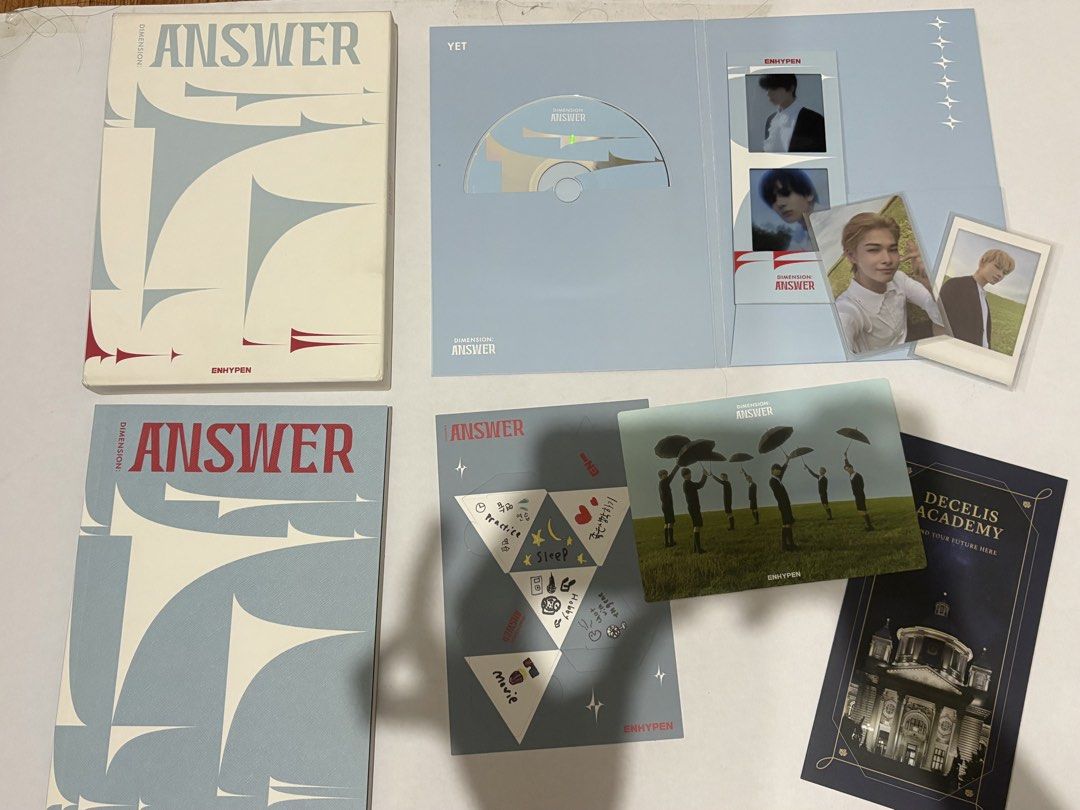 ENHYPEN DIMENSION : ANSWER Unsealed Albums (Category: CDs & DVDs) located in Manila. Submitted by rei.lia.thrifts (Listing ID 1447568689, Image 2). Description: - ENHYPEN DIMENSION: ANSWER Unsealed Album - Includes both versions (200 EA) - what’s in the photo is all the inclusions - mop: gcash only - mod: lalamove only (buyer will pay for sf) - selling within metro manila area only - rfs: decluttering/retired collector - loc: pandacan manila NO M