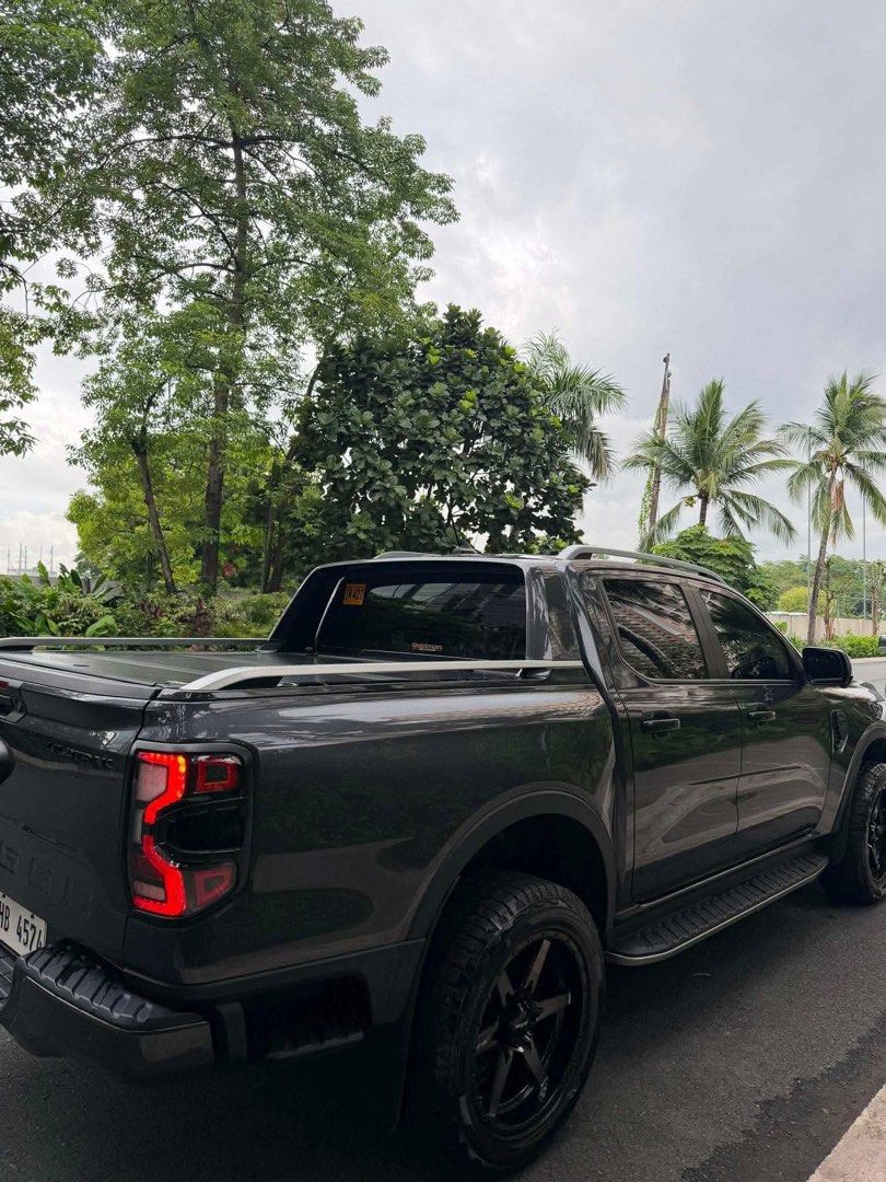 Ford Ranger Wildtrak 4x4 Auto (Category: Used Cars) located in Manila. Submitted by quality_cars (Listing ID 1447620671, Image 3). Description: 2023 Ford Ranger Wildtrak 4x4 42k km 1st owned casa maintained full PPF worth 120k after market 20in mags after market grills bed cover Price: 1.378m 📍Guiguinto Bulacan.