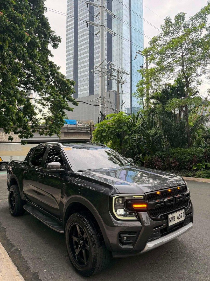 Ford Ranger Wildtrak 4x4 Auto (Category: Used Cars) located in Manila. Submitted by quality_cars (Listing ID 1447620671, Image 2). Description: 2023 Ford Ranger Wildtrak 4x4 42k km 1st owned casa maintained full PPF worth 120k after market 20in mags after market grills bed cover Price: 1.378m 📍Guiguinto Bulacan.