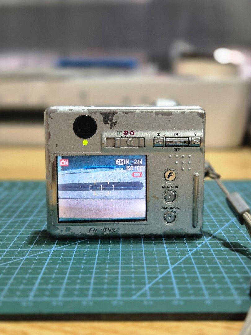 Fujifilm finepix F440 (Category: Cameras) located in Iloilo. Submitted by heyjay10 (Listing ID 1447498571, Image 1). Description: Finepix F440 inclusion: Unit & battery only - working -paint scratches - screen peeling but still usable - all buttons working - Visible dust when pointing directly to light/sun. affects the output - selling as is Loc: Iloilo city shipping available .