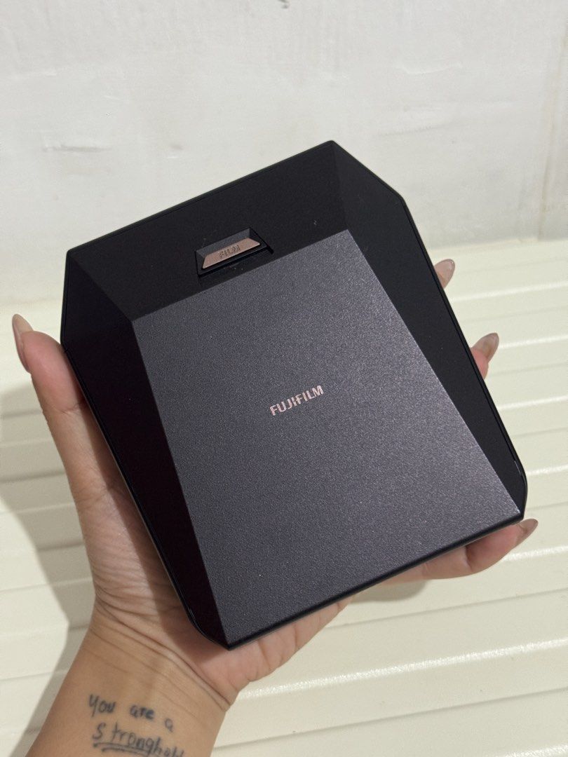 Fujifilm Instax Share SP-3 SQ Printer (Category: Printers, Scanners & Copiers) located in Quezon City. Submitted by gellydgaf (Listing ID 1447494351, Image 2). Description: - Fujifilm Instax Share SP-3 SQ Printer - Color: Black - Prints square photos - Wireless connection to smartphone - Easy to use for instant prints - Ideal for parties and events - Comes with original packaging.