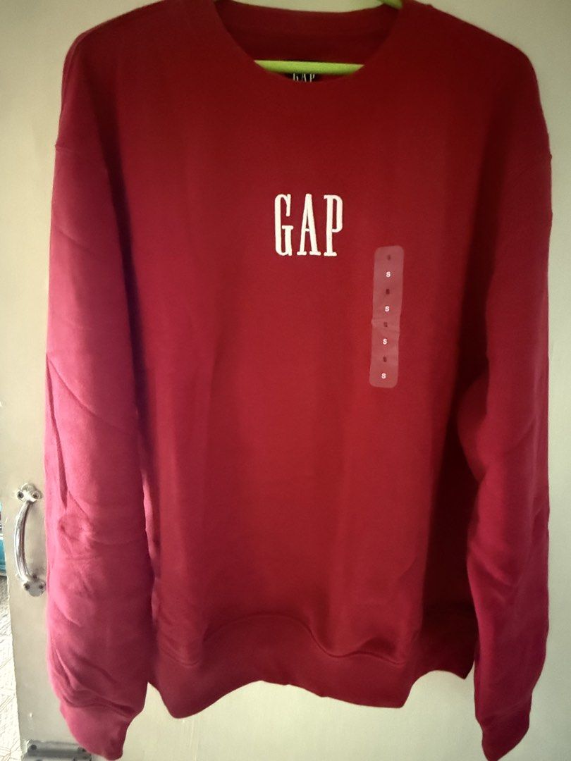 GAP Red Crewneck Sweatshirt Size S (Category: Coats, Jackets and Outerwear) located in Bacoor. Submitted by jayps07 (Listing ID 1447476045, Image 1). Description: - Brand: GAP - Item: Sweatshirt - Style: Crewneck - Features: Embroidered GAP logo on front - Size: S - Condition: Brand new with tags, never worn.