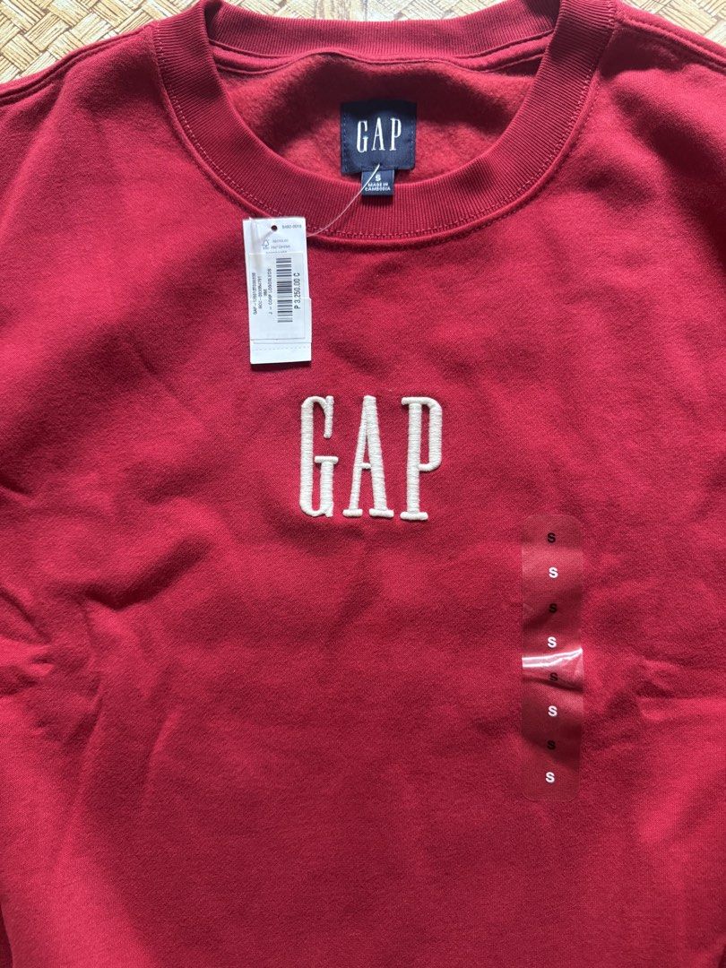 GAP Red Crewneck Sweatshirt Size S (Category: Coats, Jackets and Outerwear) located in Bacoor. Submitted by jayps07 (Listing ID 1447476045, Image 2). Description: - Brand: GAP - Item: Sweatshirt - Style: Crewneck - Features: Embroidered GAP logo on front - Size: S - Condition: Brand new with tags, never worn.