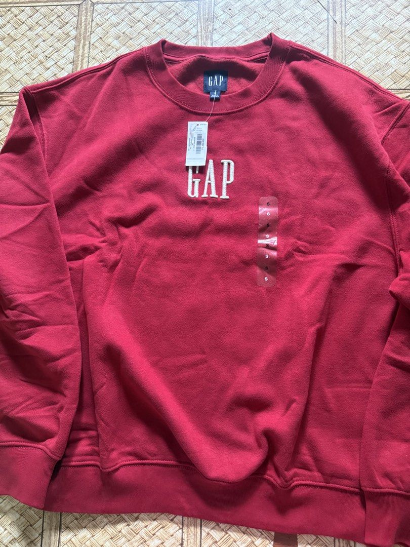 GAP Red Crewneck Sweatshirt Size S (Category: Coats, Jackets and Outerwear) located in Bacoor. Submitted by jayps07 (Listing ID 1447476045, Image 3). Description: - Brand: GAP - Item: Sweatshirt - Style: Crewneck - Features: Embroidered GAP logo on front - Size: S - Condition: Brand new with tags, never worn.
