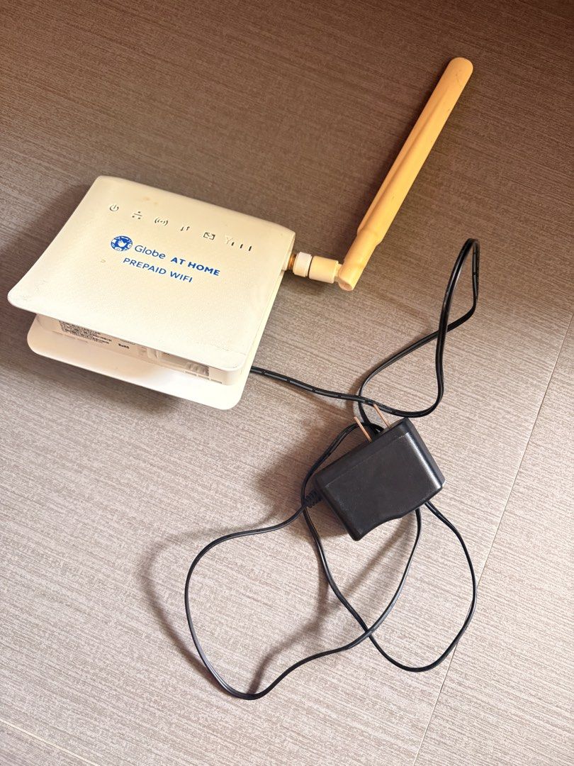 Globe At Home Prepaid WiFi Modem with Adapter (Category: Networking) located in Manila. Submitted by softiesspreloved (Listing ID 1447521290, Image 1). Description: - Globe At Home Prepaid WiFi modem - Includes original power adapter - Ready to use: just insert SIM card and load - Ideal for home or office - Tested and confirmed working.