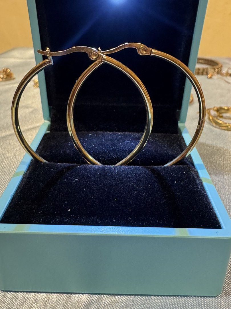 Gold Hoop Earrings and Diamond Ring Set (Category: Earrings) located in Cebu City. Submitted by xkimberly (Listing ID 1447618369, Image 2). Description: - Classic gold hoop earrings - Small pair and medium pair - extra pair with unique twisted band design on the ring - Ideal for gifting or personal use .