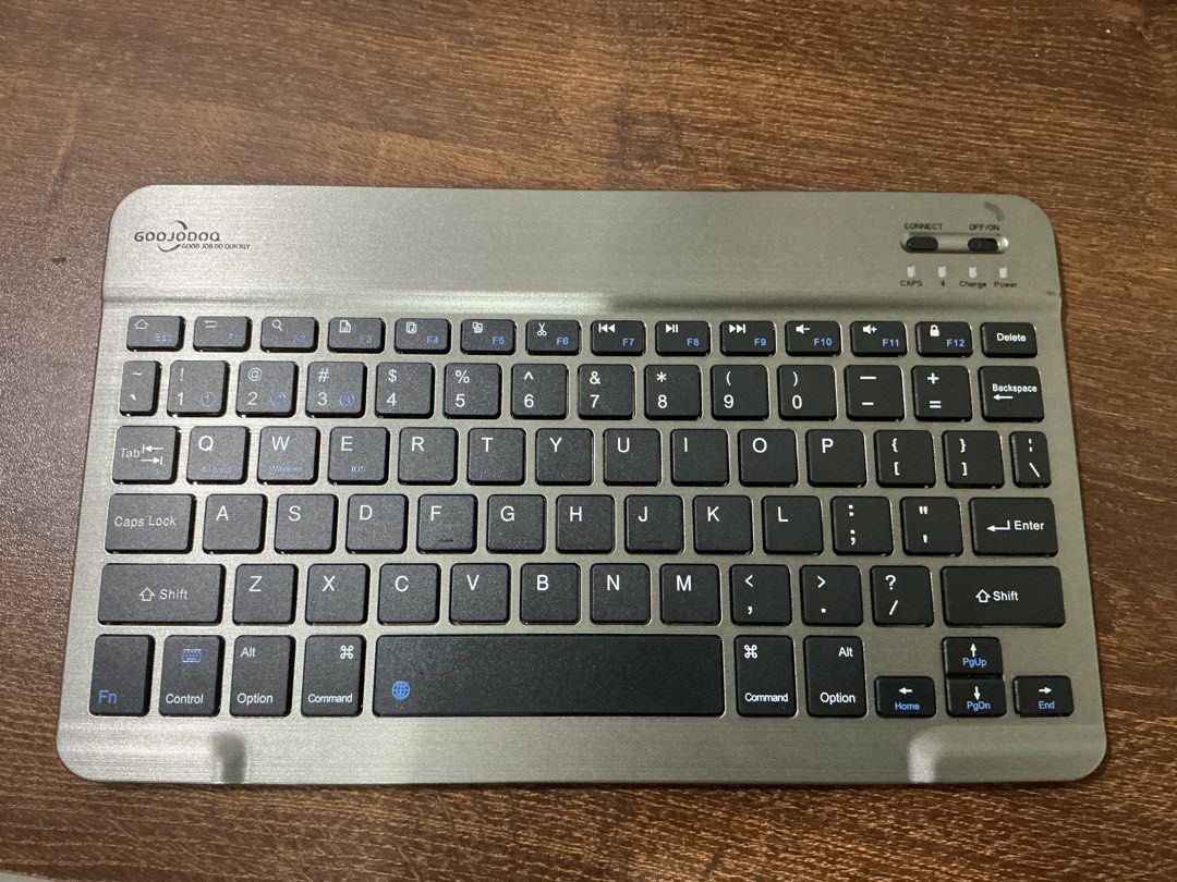 GOOJODOQ Ultra-Slim Bluetooth Keyboard and Mouse Set (Category: Computer Keyboard) located in Muntinlupa City. Submitted by sundayredvelvetmoon (Listing ID 1447542951, Image 1). Description: - GOOJODOQ ultra-slim Bluetooth keyboard - Wireless connectivity - Caps Lock and Charging indicator lights - Rechargeable battery - Compatible with various devices - Ideal for on-the-go typing - Compact and portable design.