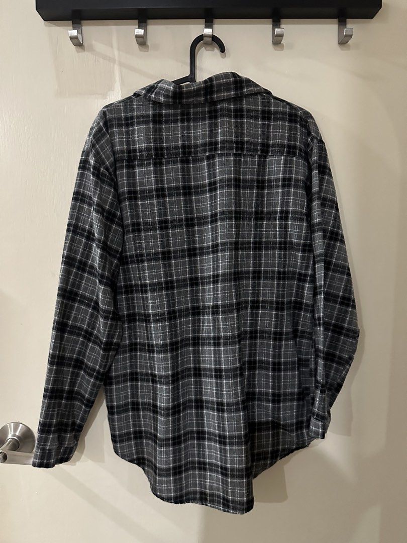 Grey Plaid Flannel Shirt (Category: Longsleeves) located in Manila. Submitted by bellevd (Listing ID 1447548794, Image 2). Description: - Classic grey plaid flannel shirt - Long sleeves with button cuffs - Single chest pocket - Soft material for comfort - Versatile for layering or wearing alone - Perfect for casual outfits.