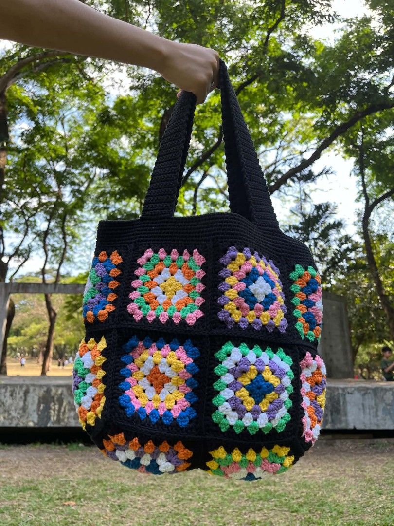 Handmade Crochet Granny Square Tote Bag (Category: Tote Bags) located in Caloocan City. Submitted by mncelle (Listing ID 1447584244, Image 2). Description: Add a pop of color to your daily style with a crochet bag that I personally hand-crafted with so much love and care!Featuring vibrant granny square design, it brings a fun energy to any outfit and perfect as everyday bag because it's not just super cute, but also sturdy and functional for all 