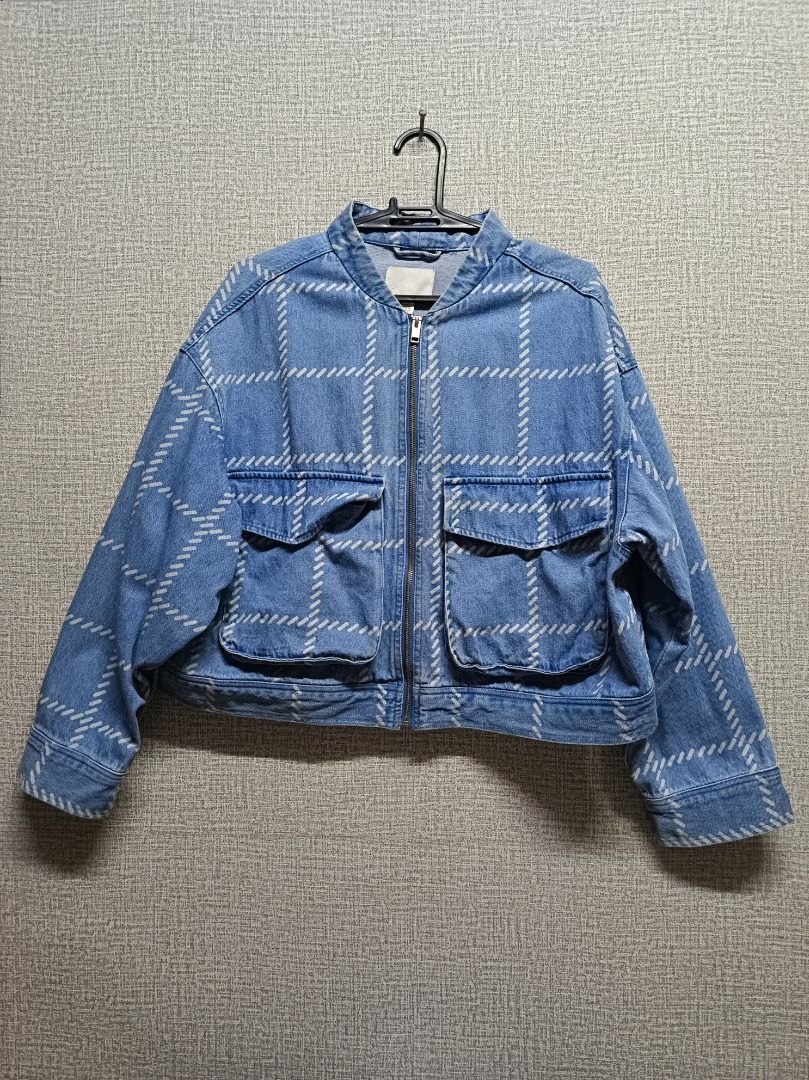 H&M Blue Plaid Denim Bomber Jacket XL (Category: Coats, Jackets and Outerwear) located in Caloocan City. Submitted by simplysecondhand_bulacan (Listing ID 1447565013, Image 1). Description: - Brand: H&M (Women's) - Style: Denim Jacket - Color: Blue Plaid - Features: Zip-up front, two chest pockets, elasticated cuffs and hem - Material: 100% Cotton - Perfect for: Layering.