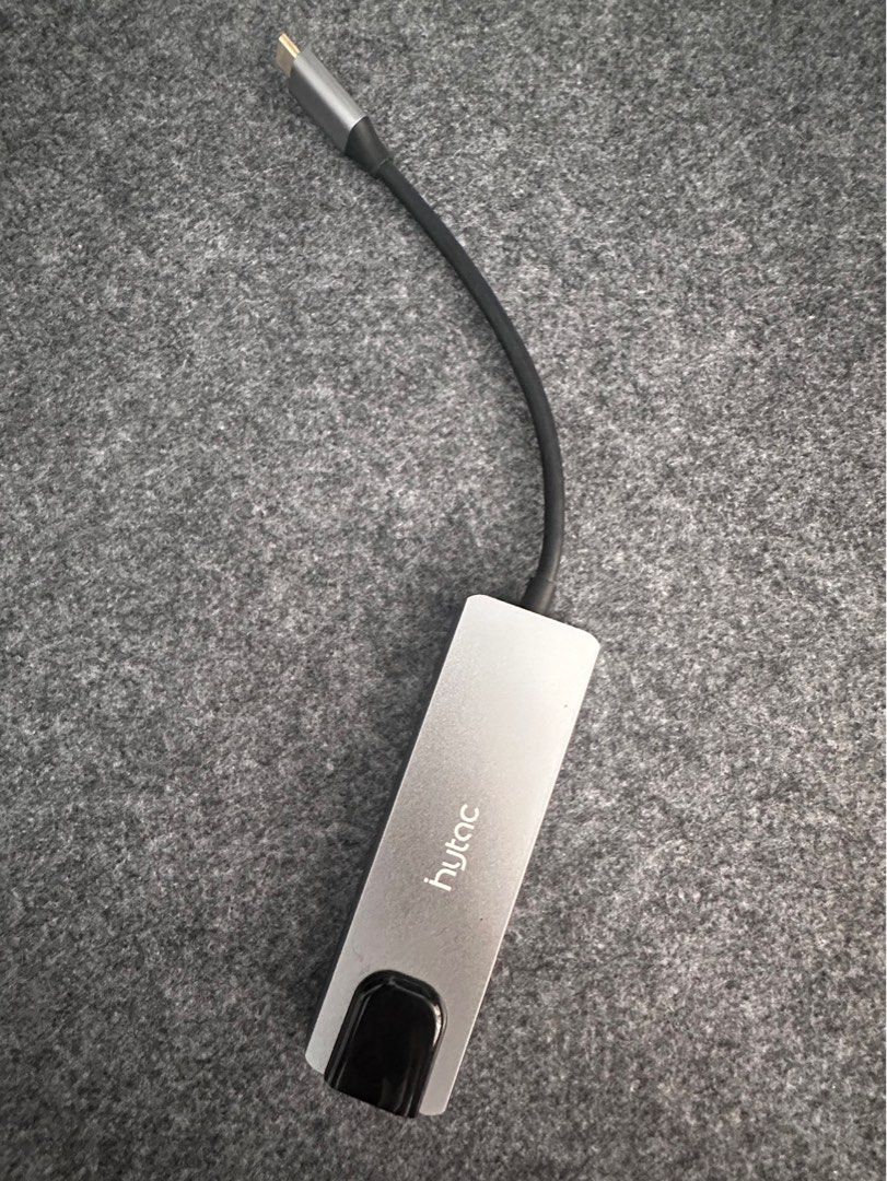 Hytac USB-C Hub Adapter with HDMI, USB 3.0, SD Card Reader (Category: Cables & Adaptors) located in Cainta. Submitted by nezue (Listing ID 1447555190, Image 1). Description: - Hytac USB-C Hub - Sleek silver aluminum casing - Expands laptop connectivity via USB-C - Ports: 1x HDMI, 2x USB 3.0, 1x SD Card Slot - Compact and portable design.
