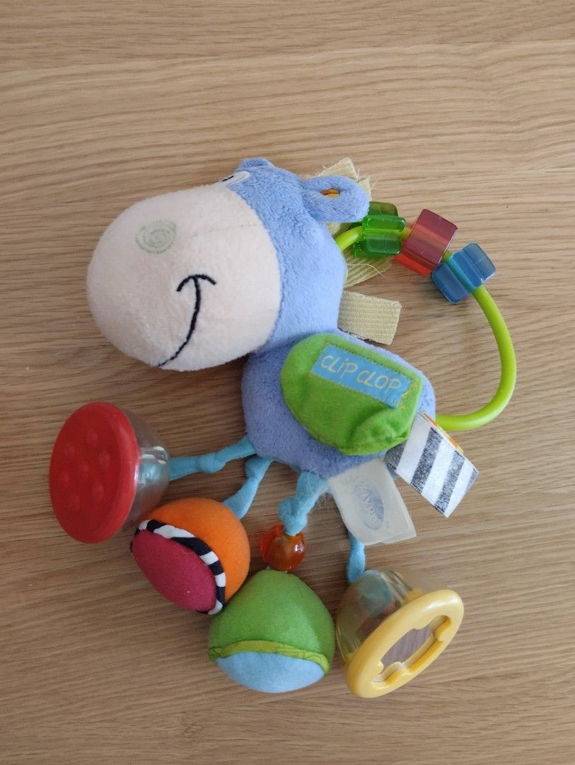 Infantino Sensory Rattles and Teethers Set (Category: Infant Playtime) located in Antipolo. Submitted by PickClickShip (Listing ID 1447476054, Image 3). Description: Preloved Branded Baby Toys - Item 1 - Rattle,tetther, sensory toys, 1pc @P180, 1set-3pcs @P500 - Playgro brand- EA cost around 500-900 EA - Bead buddy Giraffe, twinkle stick Pup, activity horse clip clip - Set of 3 fun sensory,sound and colour toys for babies. - Red dog rattle with a