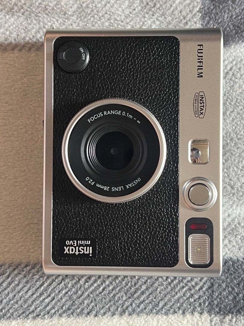 Instax Mini Evo Black with 32gb SD Card (Category: Cameras) located in Baguio. Submitted by ac.peazy (Listing ID 1447656057, Image 2). Description: Hybrid: Digital prints and instant film Can choose which photos to print Can print and save images directly to your phone via app Uses Type-C USB charging Bought brand new for 13k Rfs: upgrade for upcoming concerts and hindi na 'to nagagamit sayang naman Rarely used (3-4 times lang) and well taken car