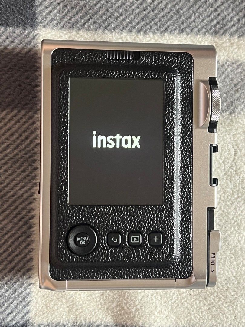 Instax Mini Evo Black with 32gb SD Card (Category: Cameras) located in Baguio. Submitted by ac.peazy (Listing ID 1447656057, Image 3). Description: Hybrid: Digital prints and instant film Can choose which photos to print Can print and save images directly to your phone via app Uses Type-C USB charging Bought brand new for 13k Rfs: upgrade for upcoming concerts and hindi na 'to nagagamit sayang naman Rarely used (3-4 times lang) and well taken car