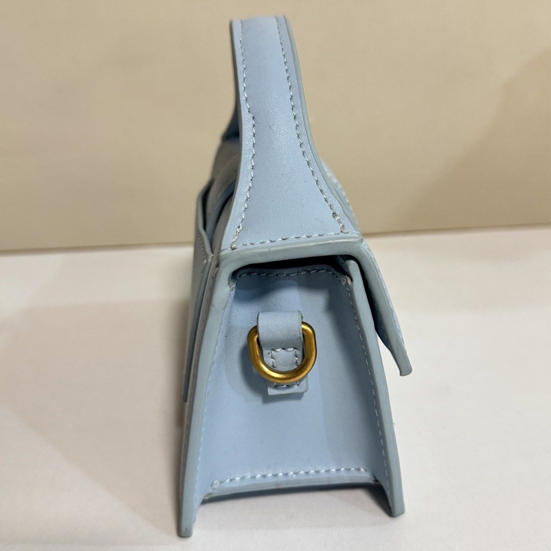 Jacquemus Le Chiquito Mini Bag Light Blue Leather (Category: Luxury Bags & Wallets) located in Pasig City. Submitted by _sfoo (Listing ID 1447619125, Image 3). Description: - Condition: 8.5/10 - Purchased this through Retro Plug’s Instagram bidding for 9k - Features: Top handle, side strap attachment, gold hardware No returns/refund after payment.