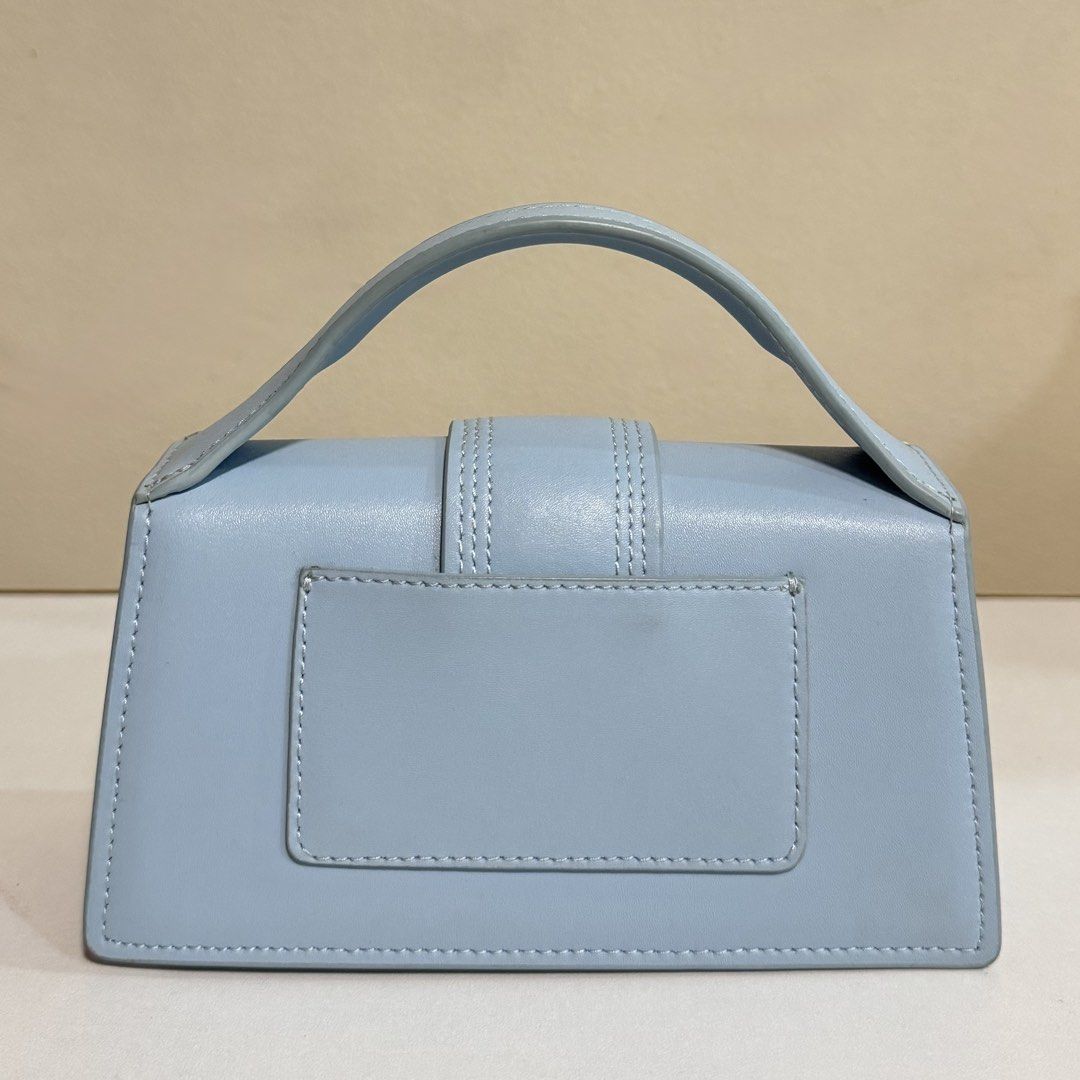Jacquemus Le Chiquito Mini Bag Light Blue Leather (Category: Luxury Bags & Wallets) located in Pasig City. Submitted by _sfoo (Listing ID 1447619125, Image 2). Description: - Condition: 8.5/10 - Purchased this through Retro Plug’s Instagram bidding for 9k - Features: Top handle, side strap attachment, gold hardware No returns/refund after payment.