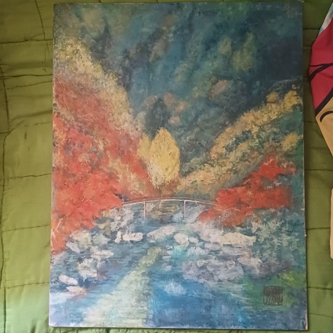 Japanese Nihonga Artwork (Autumn River & Bridge) (Category: Wall Decor) located in Batac City. Submitted by silvercrystal_fd03a9 (Listing ID 1447676092, Image 1). Description: ​A beautiful, authentic Japanese Nihonga painting made in 2013. Painted on a sturdy local board, this striking piece captures a scenic autumn landscape featuring vibrant red, orange, and golden foliage flanking a rushing rocky river a classic, minimalist arched footbridge e