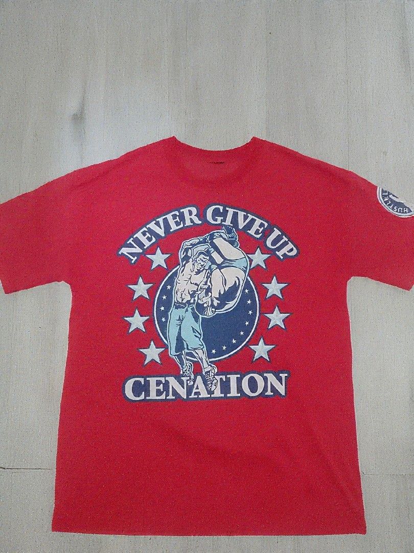 John Cena "Never Give Up" T-Shirt (Category: Tshirts & Polo Shirts ) located in Quezon City. Submitted by chrisza66591165 (Listing ID 1447602946, Image 1). Description: WWE JOHN CENA SHIRT 2010 *cut tags DIMES: 28.5L, 21W NO ISSUES ₱250.