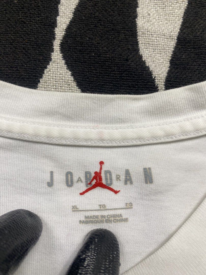 Jordan "Shattered Backboard" T-Shirt White (Category: Tshirts & Polo Shirts ) located in Cebu City. Submitted by theloose.thread (Listing ID 1447644396, Image 3). Description: - White Jordan T-Shirt - Size: XL - "Shattered Backboard" graphic in vibrant orange - Authentic Jordan logo - Product Code included - Made in China, Designed in Oregon - A must-have for any Jordan enthusiast!.
