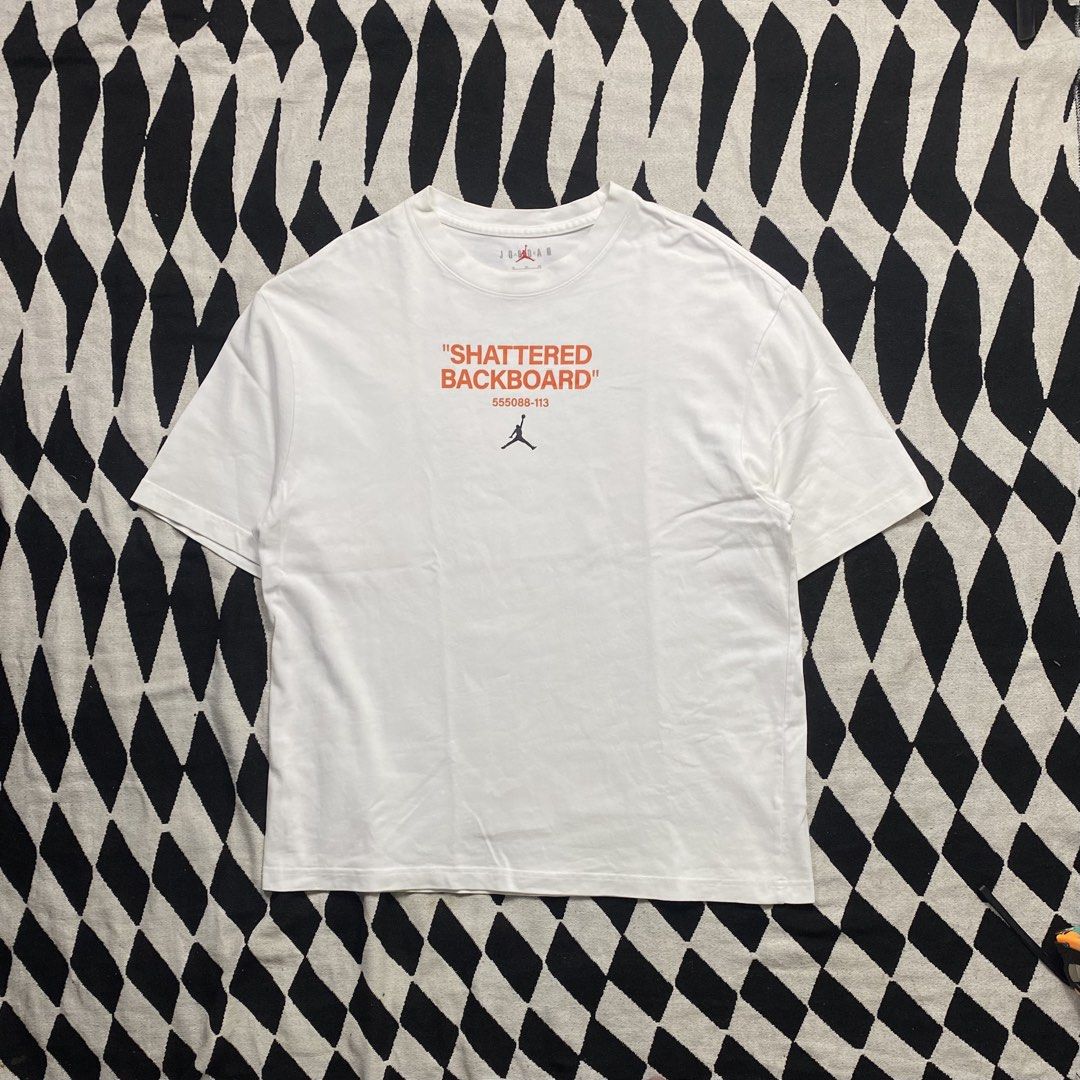 Jordan "Shattered Backboard" T-Shirt White (Category: Tshirts & Polo Shirts ) located in Cebu City. Submitted by theloose.thread (Listing ID 1447644396, Image 1). Description: - White Jordan T-Shirt - Size: XL - "Shattered Backboard" graphic in vibrant orange - Authentic Jordan logo - Product Code included - Made in China, Designed in Oregon - A must-have for any Jordan enthusiast!.