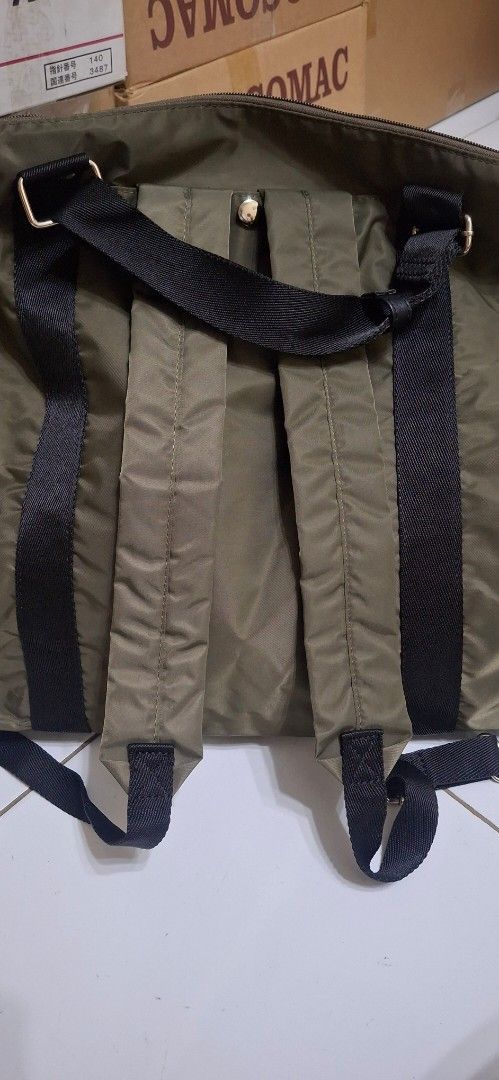 L'AMI+ Tote Bag Khaki Green (Category: Tote Bags) located in Manila. Submitted by youngcloud_b1fffa (Listing ID 1447655666, Image 3). Description: - Khaki green L'AMI+ tote bag - Main zip compartment for secure storage - Two side pockets with adjustable drawstring closure - Durable handles for comfortable carrying - Detachable and adjustable shoulder strap for versatility - Spacious interior, ideal for everyday essentials or travel needs "R&B Mix