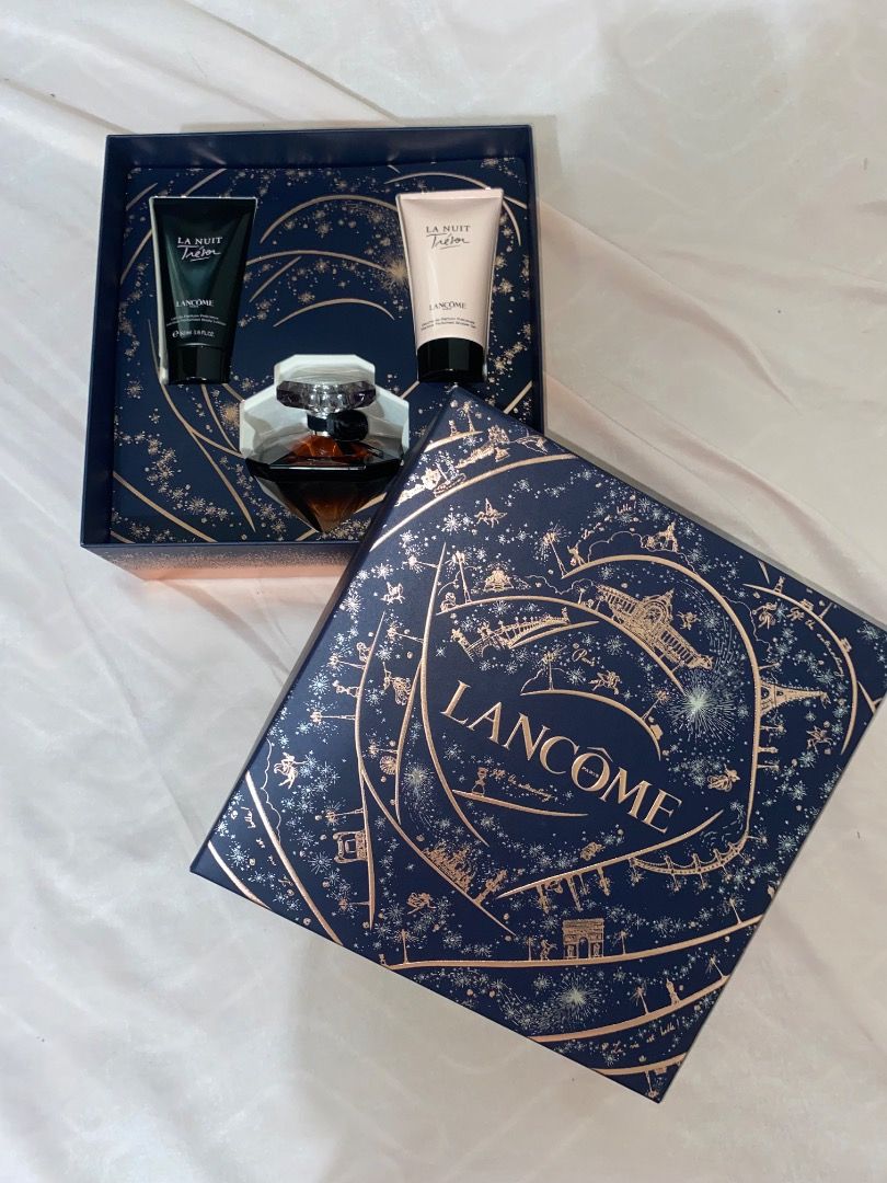 Lancome La Nuit Tresor Perfume Gift Set (Category: Fragrance & Deodorants) located in Caloocan City. Submitted by alieniaic (Listing ID 1447526697, Image 2). Description: - Lancome La Nuit Tresor Gift Set - Includes perfume bottle and two lotions - Beautiful navy blue box with rose gold starry design - Features a lovely heart design on the lid - Ideal for gifting or personal use.